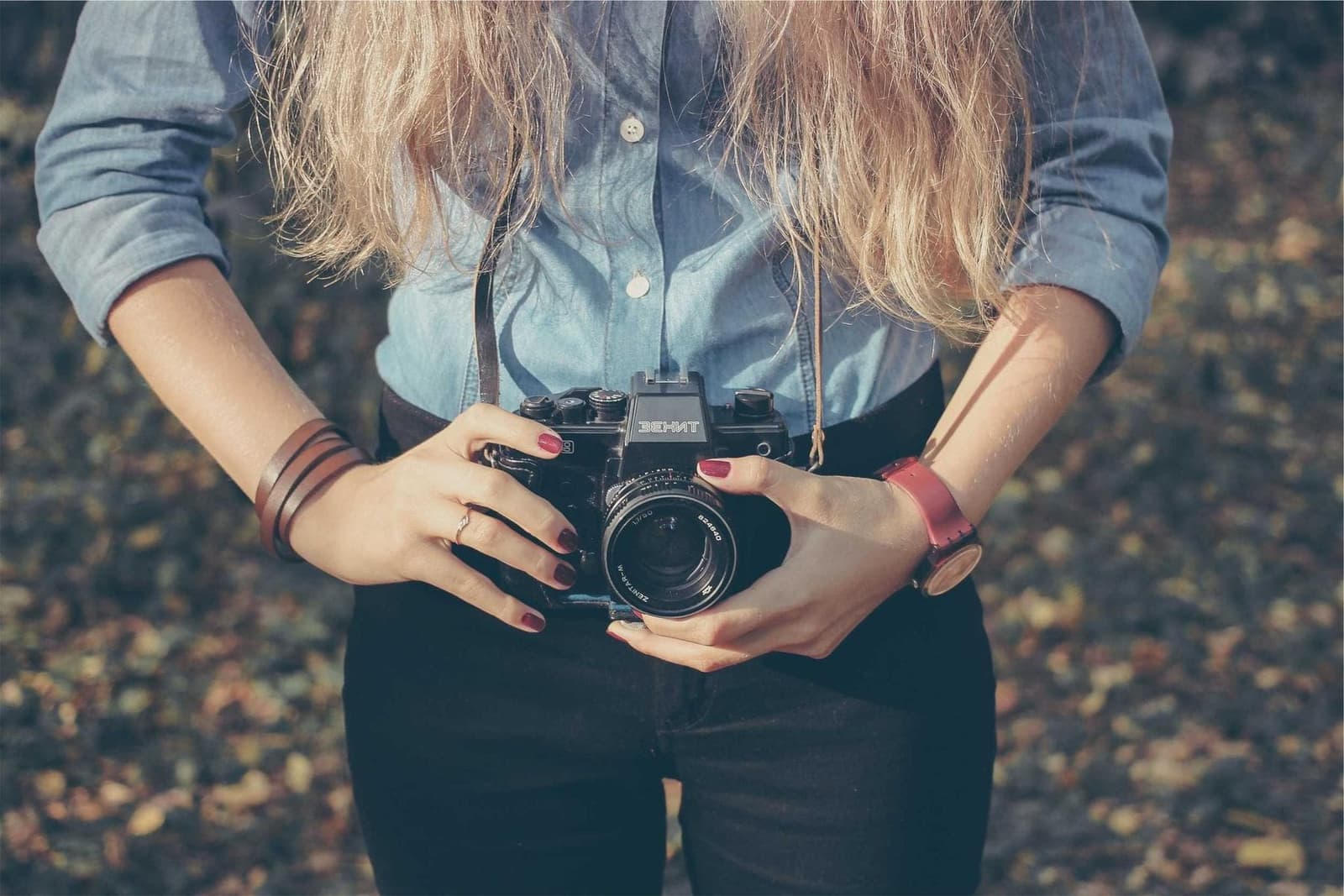 Someone holding a camera.