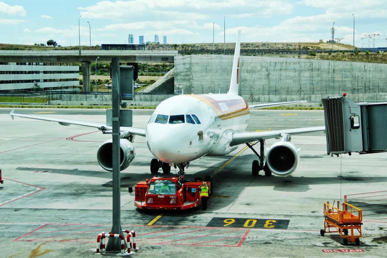 A passenger plane on the tarmac.