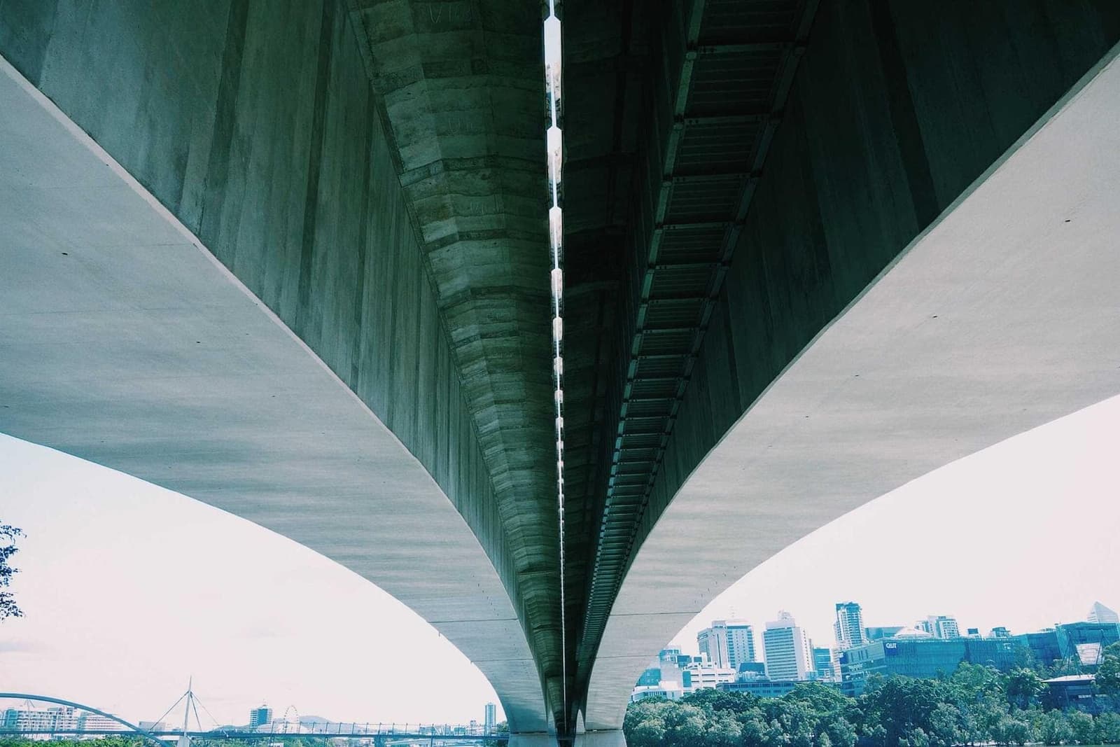 The underside of a bridge, seen from below.