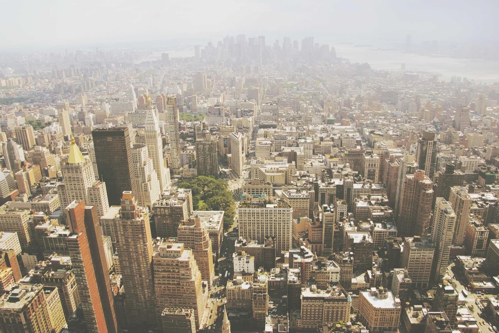 A city seen from above, in haze.